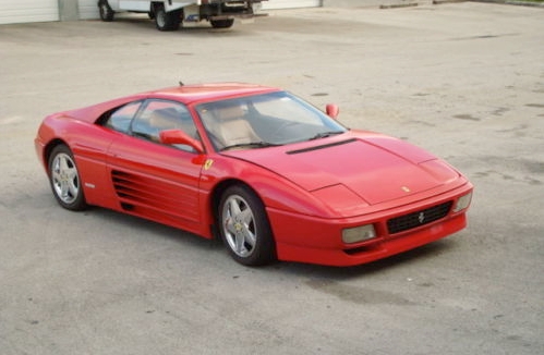 This is a Ferrari 348 TS, 1989 model year. It has the “Magnum PI” style 