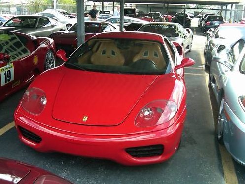 This is a 2001 Ferrari 360 Modena. Red with tan interior and only 23k 